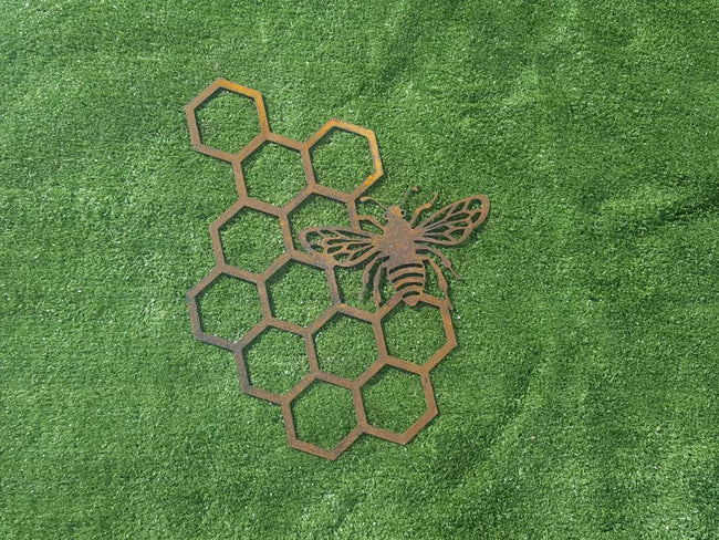 Bee and honeycomb metal wall art